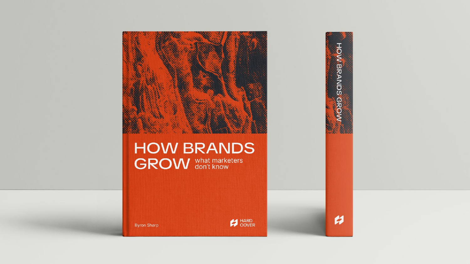 Mockup de livro — How Brands Grow, capa laranja Hardcover